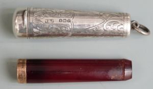 George V cherry amber cheroot holder with 9ct gold mount, in hallmarked silver case with engraved