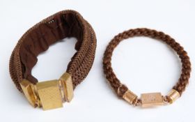 Two Victorian plaited hair bracelets with gilt clasps