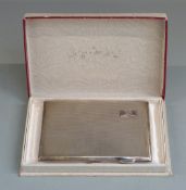 George VI hallmarked silver cigarette case with engine turned decoration and gift interior,