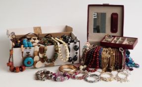 A collection of costume jewellery including silver bangle, silver pendant, a section of filigree,