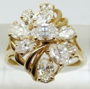 A 9ct gold ring set with cubic zirconia, 4.7g, size Q