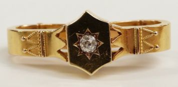 Victorian/ Edwardian 15ct gold scarf clip set with an old cut diamond in a star setting