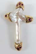 An 18ct gold cross pendant set with a pearl and rubies, 4 x 2.4cm
