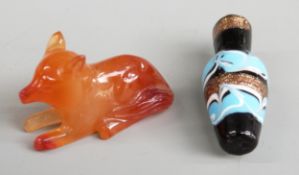 A carnelian agate dog or fox, length 3.5cm and a Venetian glass bead or miniature vase