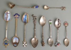 Ten various white metal souvenir spoons, mostly marked 800 but including a Swedish example and