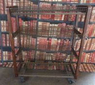 Industrial/haberdashery/shopfitting steel and weldmesh display/shelf unit raised on wheels with an