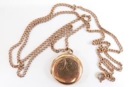 A 9ct gold necklace and circular locket, 27cm drop, 6.3g
