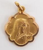 An 18ct gold pendant with relief decoration of the Virgin Mary, 1.8g