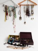 A collection of costume jewellery including necklaces, brooches, abalone bangle, etc
