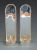 A pair of Walter Vernon modern feature hallmarked silver wall mounted candle sconces, London maker's