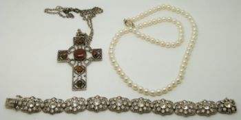 A silver bracelet set with paste, a cultured pearl necklace and a silver cross pendant set with