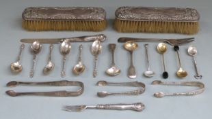 A quantity of hallmarked silver cutlery including Georgian bright cut sugar tongs, set of six