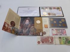 A small collection of modern crowns, 1963 UK coin set, banknotes etc