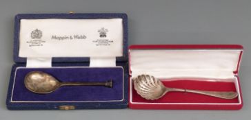 Two cased hallmarked silver spoons, one a Mappin & Webb seal top example with rose to top, weight