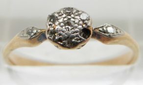 A gold ring set with diamonds in a platinum setting, 2.3g, size P