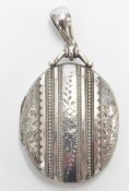 Edwardian silver locket with floral and foliate decoration, Birmingham 1902