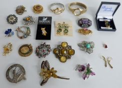 A collection of brooches including silver, Miracle, enamel, Timex watch, automatic Smiths watch, a