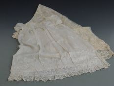 Late 19th/20thC christening gown with embroidered and lace decoration