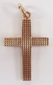 A 9ct gold cross with chequered textured detail, 2.7g