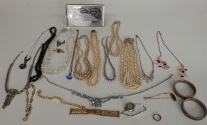 A collection of costume jewellery including vintage paste, faux pearl, silver stag brooch, Art