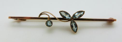 A 9ct gold brooch set with aquamarines