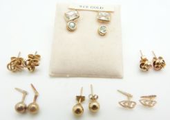 Three pairs of 9ct gold earrings (1.8g), two pairs of 9ct gold earrings set with cubic zirconia