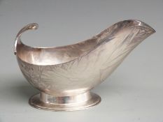 Art Deco hallmarked silver sauce boat with stylised handle, London 1936 maker Charles Boyton & Son