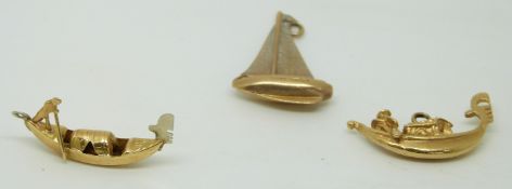 Three 9ct gold charms depicting boats, 7g