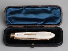 Cased Victorian hallmarked silver gilt mother-of-pearl handled folding fruit knife, Sheffield 1893