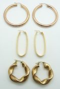 A pair of 9ct gold hoop earrings (8g) and two pairs of Milor earrings