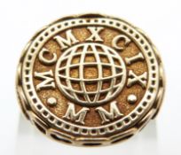 A 9ct gold ring with millennium panel, 4.9g, size Y