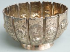 Victorian hallmarked silver bowl of lobed design decorated with oriental scene. London 1868 maker
