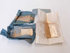 A quantity of gold dust in wrapped paper with printer's label, probably for illuminating