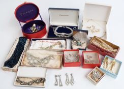 A collection of costume jewellery including diamanté, Swarovski brooch, filigree brooches etc