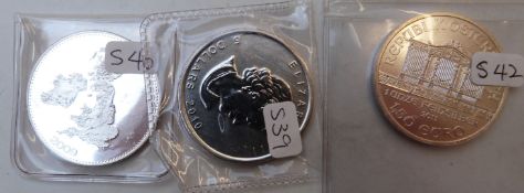 Silver 2010 Canadian Maple, 2009 Britannia and a 150 Euro coin