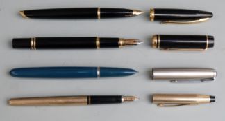 Four various fountain pens comprising two Waterman examples both with black resin barrels and caps
