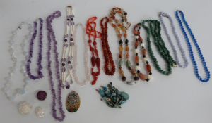 A collection of beaded necklaces including Egyptian, amethyst, agate, etc