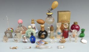 Collection of scent bottles and atomizers including a yellow guilloche' enamel example marked