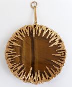 A 9ct gold bespoke pendant set with a circular section of tiger's eye by Hooper Bolton, 37.1g (6cm)