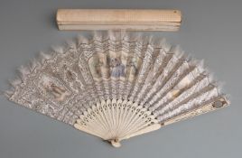 19thC bone fan, the lead guard stick with oval mirror, pierced and inlaid decoration with feather