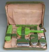 Art Deco green plastic and plated travelling set in case, width 31cm