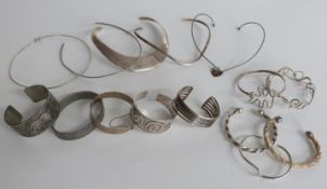Five hallmarked silver and white metal bangles and bracelets, five further bracelets, four silver