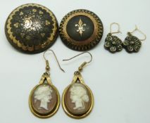 Two Victorian tortoiseshell brooches inlaid with gold, similar earrings and a pair of Victorian