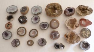 Twenty-five amethyst and similar quartz geodes.