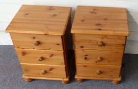 Pair of pine bedside chests of three drawers, W43 x D39 x H58cm