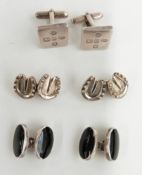 Three pairs of silver cufflinks, one formed as horseshoes, another with feature hallmarks