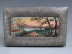 Tudric Pewter and enamel box with hinged lid, likely for Liberty and Co. The inset enamel copper