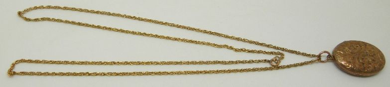 A yellow metal chain (4.1g) and an Edwardian locket