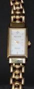 Accurist 9ct gold ladies wristwatch with gold hands and hour markers, mother of pearl dial and