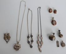 Silver necklaces and pendants including novelty cat examples